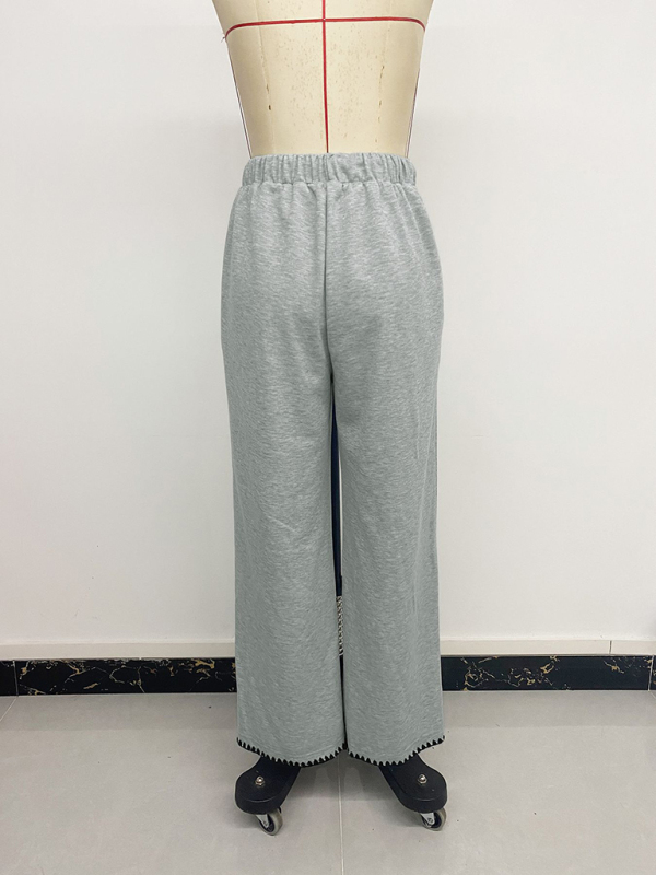 Belted casual straight-leg pants with contrasting trim and elastic waist - Image 2
